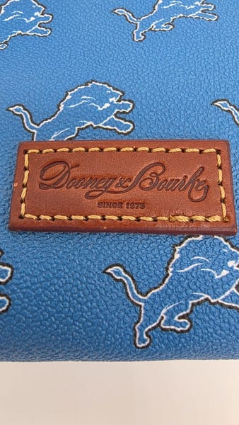 Dooney & Bourke Detroit Lions NFL Football Zip Pouch Blue & Brown, photo 2 of 7