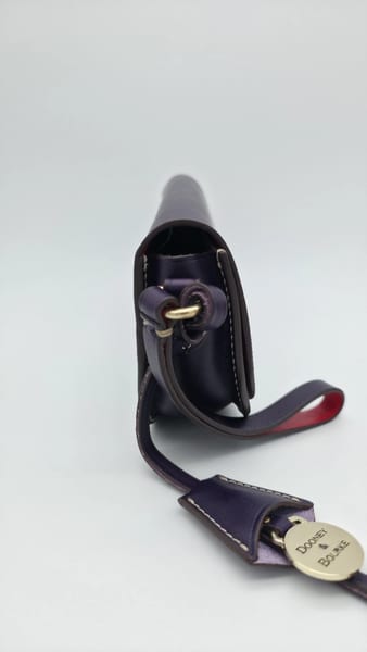 Dooney & Bourke Purple Leather Wristlet Red Lining Silver Hardware Charm, photo 4 of 10