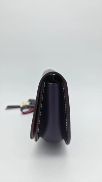 Dooney & Bourke Purple Leather Wristlet Red Lining Silver Hardware Charm, photo 5 of 10